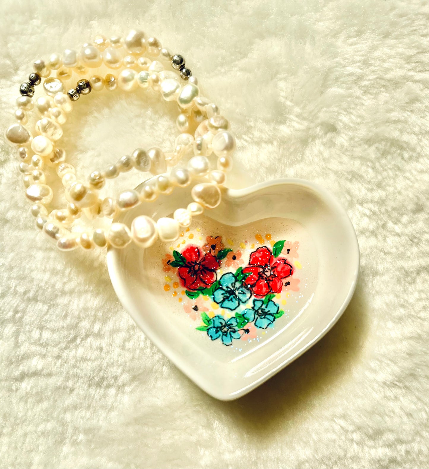 Mixed flowers on White Dish